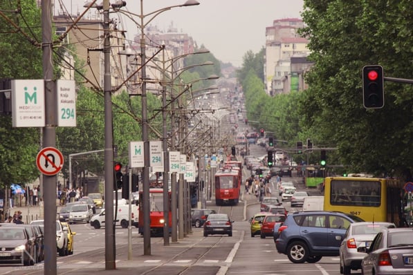 Trams on a busy street in Belgrade