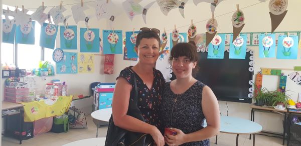 photo of special needs assistant and teacher in classroom